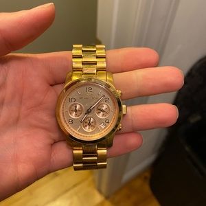 Rose gold michal Kotrs watch